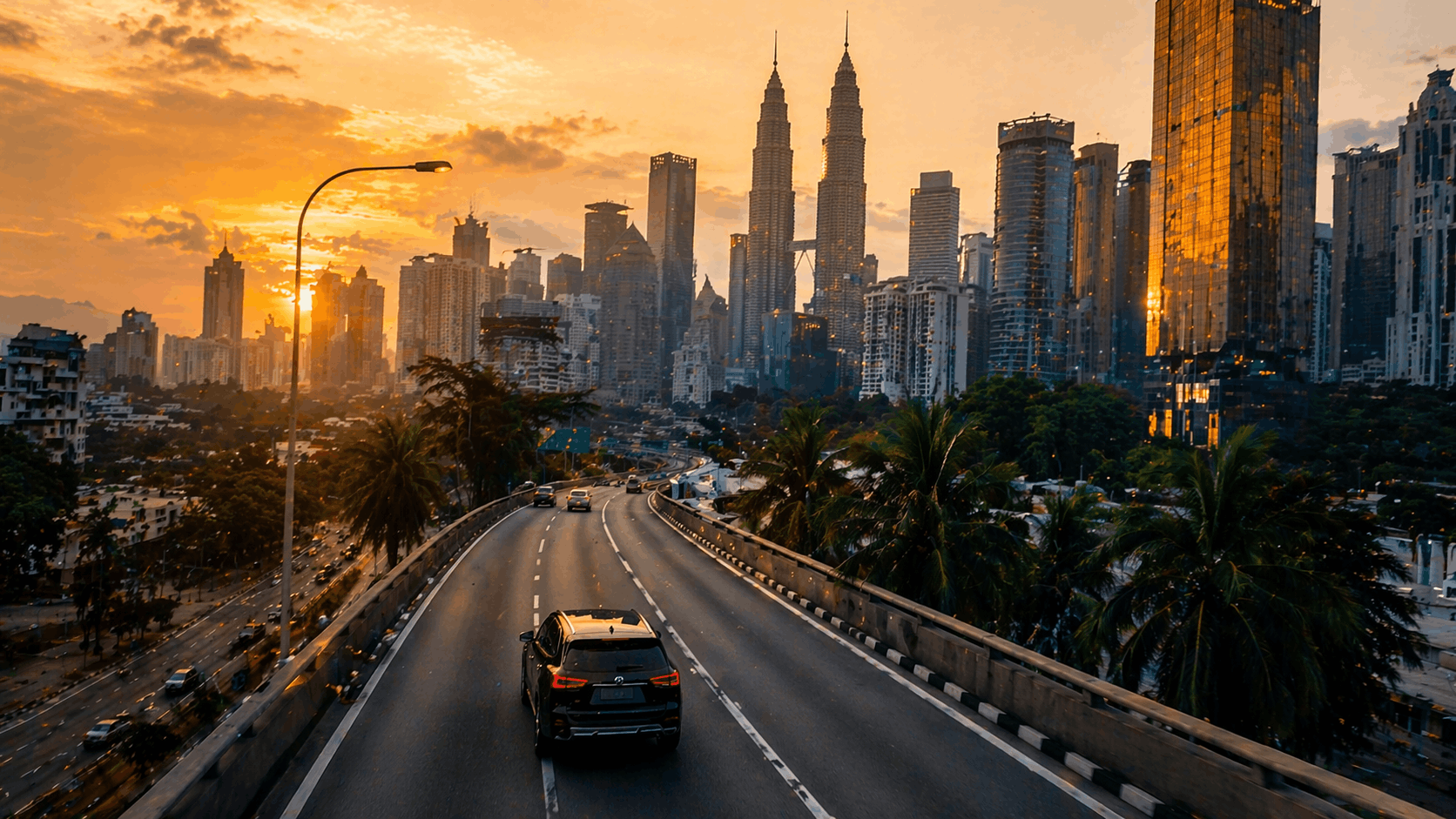 Kuala Lumpur city skyline with Petronas Twin Towers at golden hour, Malaysia